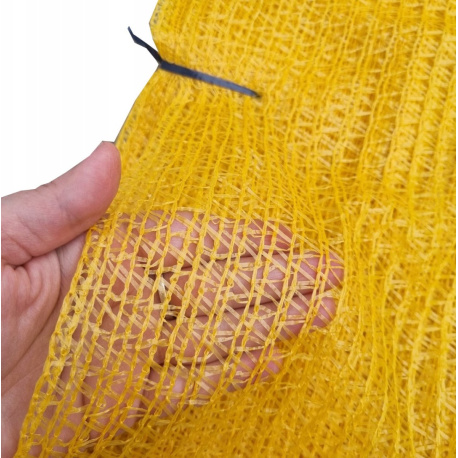 Detail žltého rašlového vreca – sieťovina sťahovacia 50×65 cm.